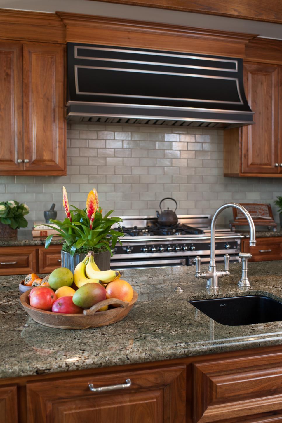 Traditional Kitchen Featuring Rich Wood Cabinetry, Gray Tile Backsplash