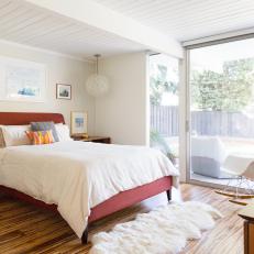 Midcentury Master Suite With Bright Bed Frame