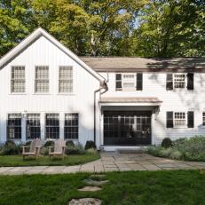 White Farmhouse with Black Shutters