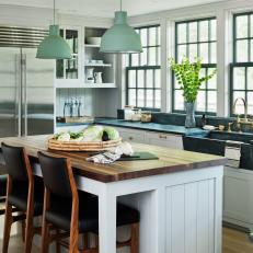 White Farmhouse Kitchen with Green Accents