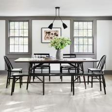 White, Modern Dining Room in Renovated Farmhouse