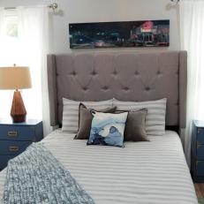 Contemporary Blue Guest Bedroom with Gray Upholstered Headboard 