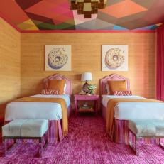 Pink and Orange Girl's Bedroom With Pink Rug