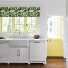 Country Kitchen With Yellow Door