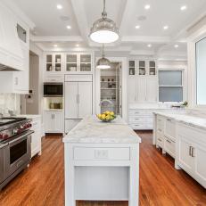 White Transitional Chef Kitchen With Metal Pendants