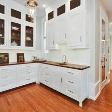 White Traditional Butler's Pantry With Wood Counters