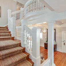 Traditional Stairs With White Railing