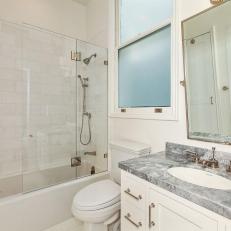 White Single-Vanity Bathroom With Gray Counter
