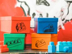 Avoid stepping on these beloved blocks by providing a fool proof storage solution that kids will like, too. Simply store the pieces in colored coordinated boxes or you can simply tape a piece of construction paper in the appropriate color to a plain shoe box.  