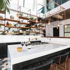 "U"-Shaped Kitchen Provides Counter Space and Casual Seating to the Home