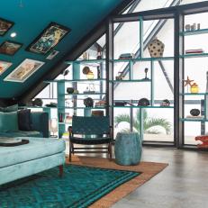 Glass Display Shelves in Teal Living Space