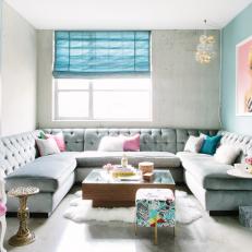 Gray Velvet Sectional Adds Seating in Girly Glam Living Space