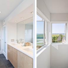 White Bathroom With Seaside Views