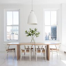White Open Dining Room With Leaves
