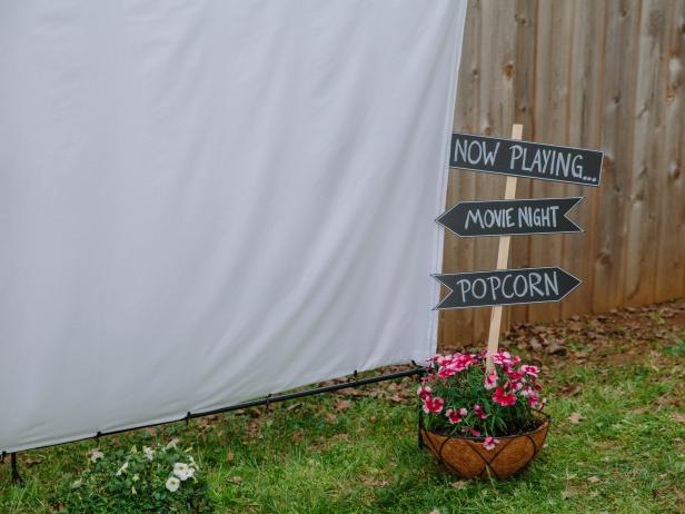 Make simple signs to add a bit of fun to your outdoor movie theater.