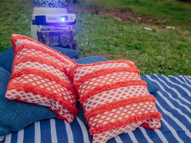 Add some throw pillows to make a comfy viewing spot.