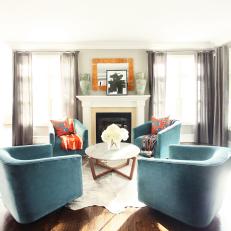 Four Blue Armchairs and Fireplace