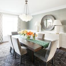 Gray and White Contemporary Dining Room With Flowers