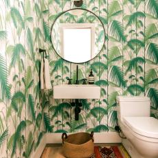 Green Powder Room With Leafy Wallpaper