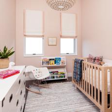 Pink Contemporary Nursery With Rag Rug