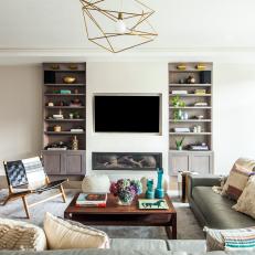 Contemporary Living Room With Gold Metal Chandelier