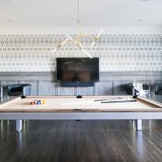 Gray and White Game Room With Pool Table