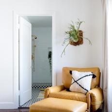 Leather and Wood Armchair and Vertical Plant