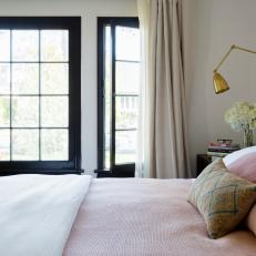 Bedroom With Pink Bed Linens