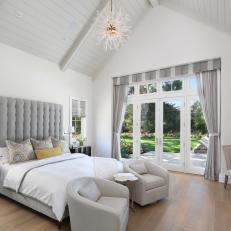 Stylish Transitional Bedroom in Gray and White