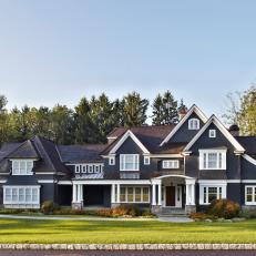 Gray Shingles on Tudor-Style Home With Copper Roofing