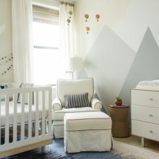 White Chair and Ottoman in Boy's Mountain Nursery 