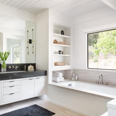 White Master Bathroom With Gray Countertop