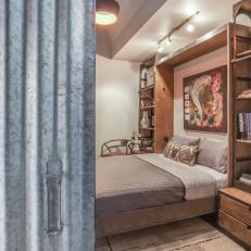 Loft Guest Bedroom With Metal Door