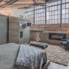 Gray Loft Master Bedroom With Fireplace