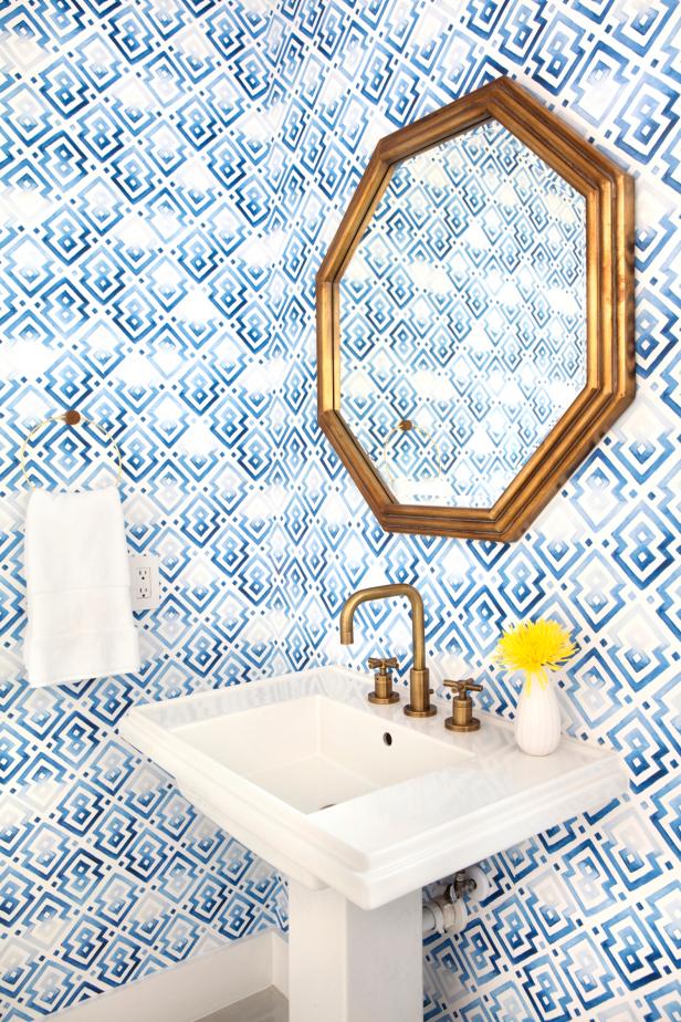 Blue Powder Bath With Graphic Wallpaper | HGTV