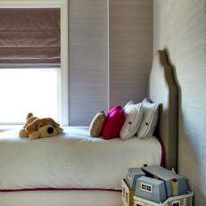 Neutral Contemporary Kid's Room With Stuffed Dog