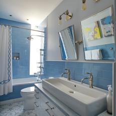 Blue Bathroom With Mosaic Tile Floor
