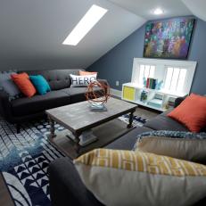Contemporary Blue Bonus Room with Brown Coffee Table 
