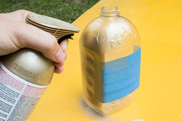 Spray paint a translucent container to make a Hidden Object toy for kids.
