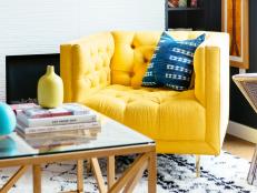Yellow Armchair and Blue Pillow