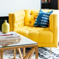 Yellow Armchair and Blue Pillow