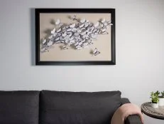 HGTV shows you how to create butterfly wall art for the Cast Shadows design trend