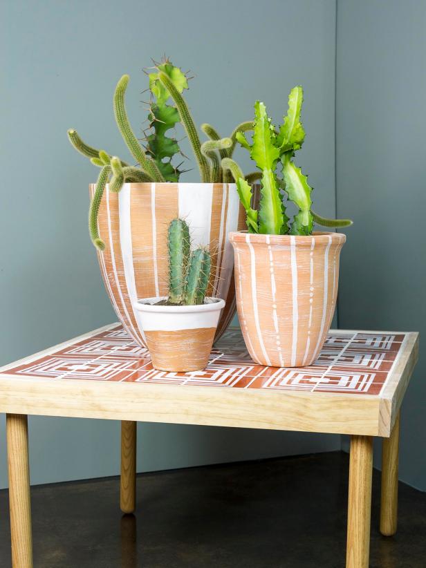 HGTV shows you how to make your own patterned terra cotta pots and a tile table