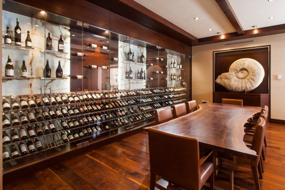 Tasting Table Next to Wall of Wine Storage