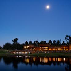 House Exterior and Pond at Night