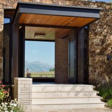 Rustic Stone Entry With Mountain View