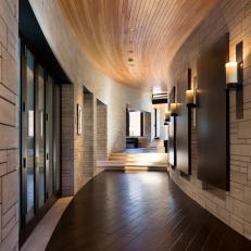 Curved Hallway With Wood Paneling