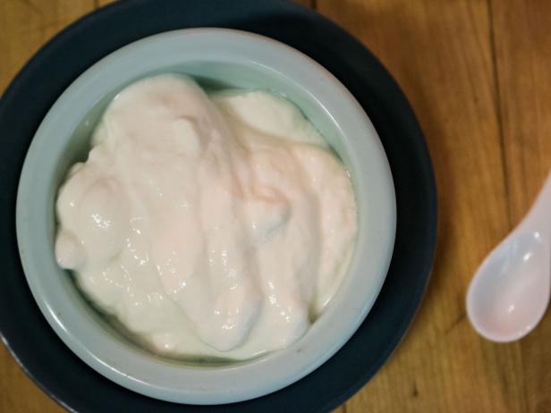 Making DIY yogurt with the help of a slow cooker.