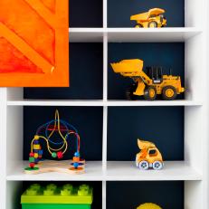 Colorful Toys are Displayed Proudly in Basement Playroom Design