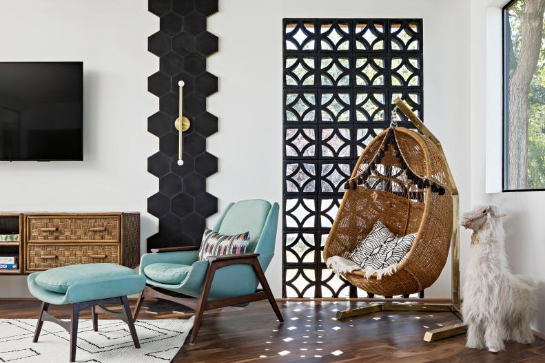 This living room and wicker egg chair create a fun place to read. 